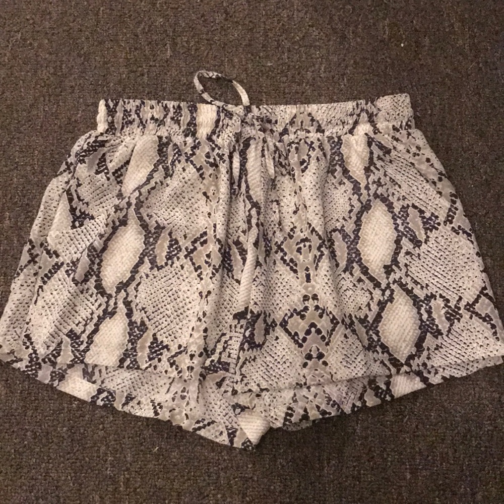 Olivaceous snakeskin print shorts size small